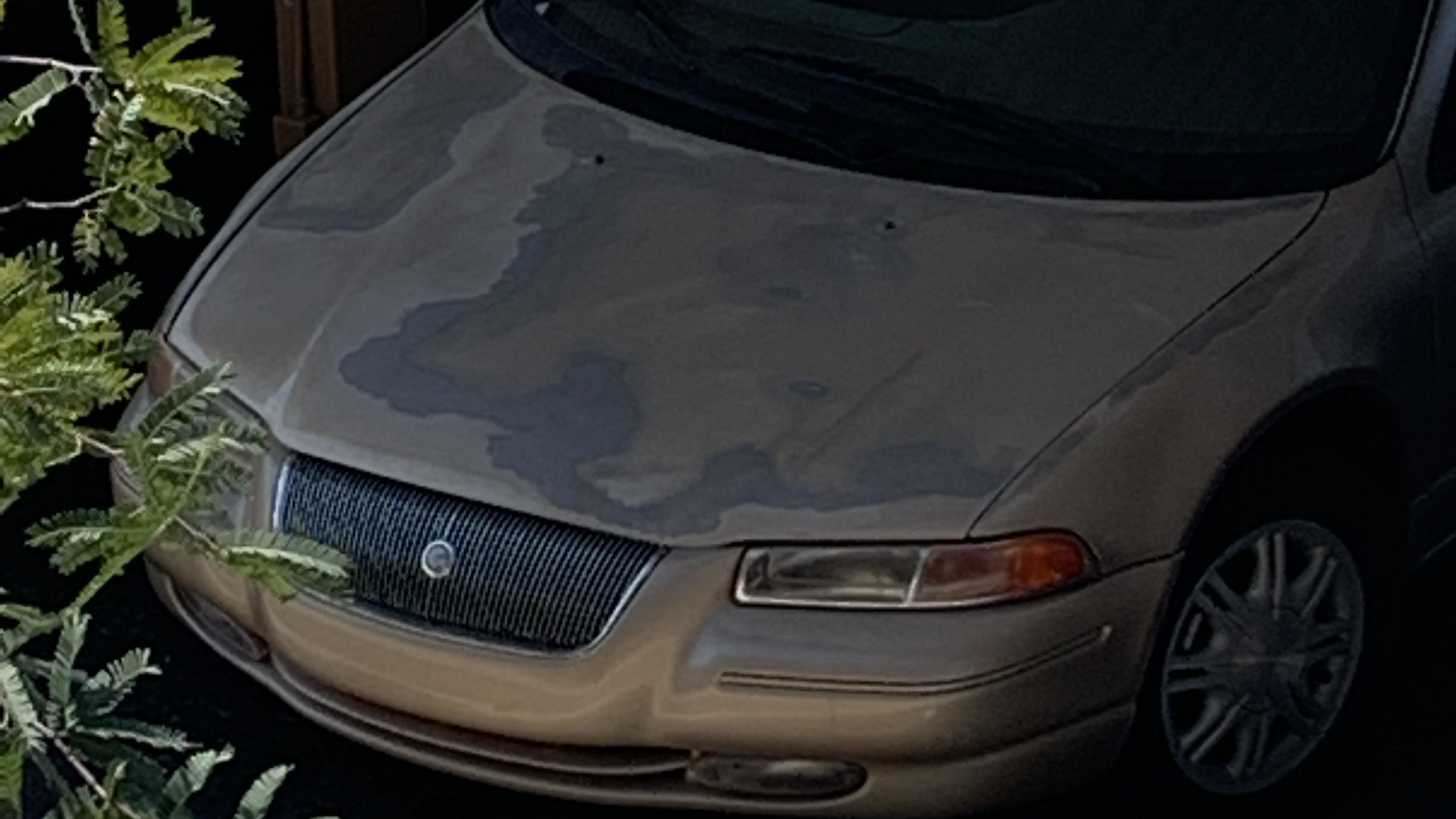 Sun damaged Chrysler Cirrus